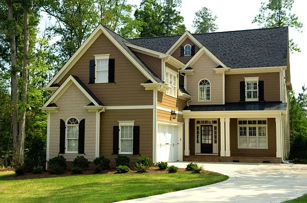 Roof durability in different climates what to know before choosing materials 6 A home with a roof built to withstand various weather conditions showcasing roof durability in different climates.